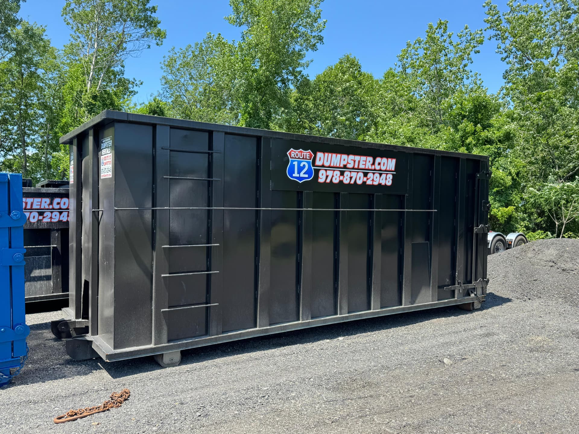 Roll-off dumpster on a residential driveway